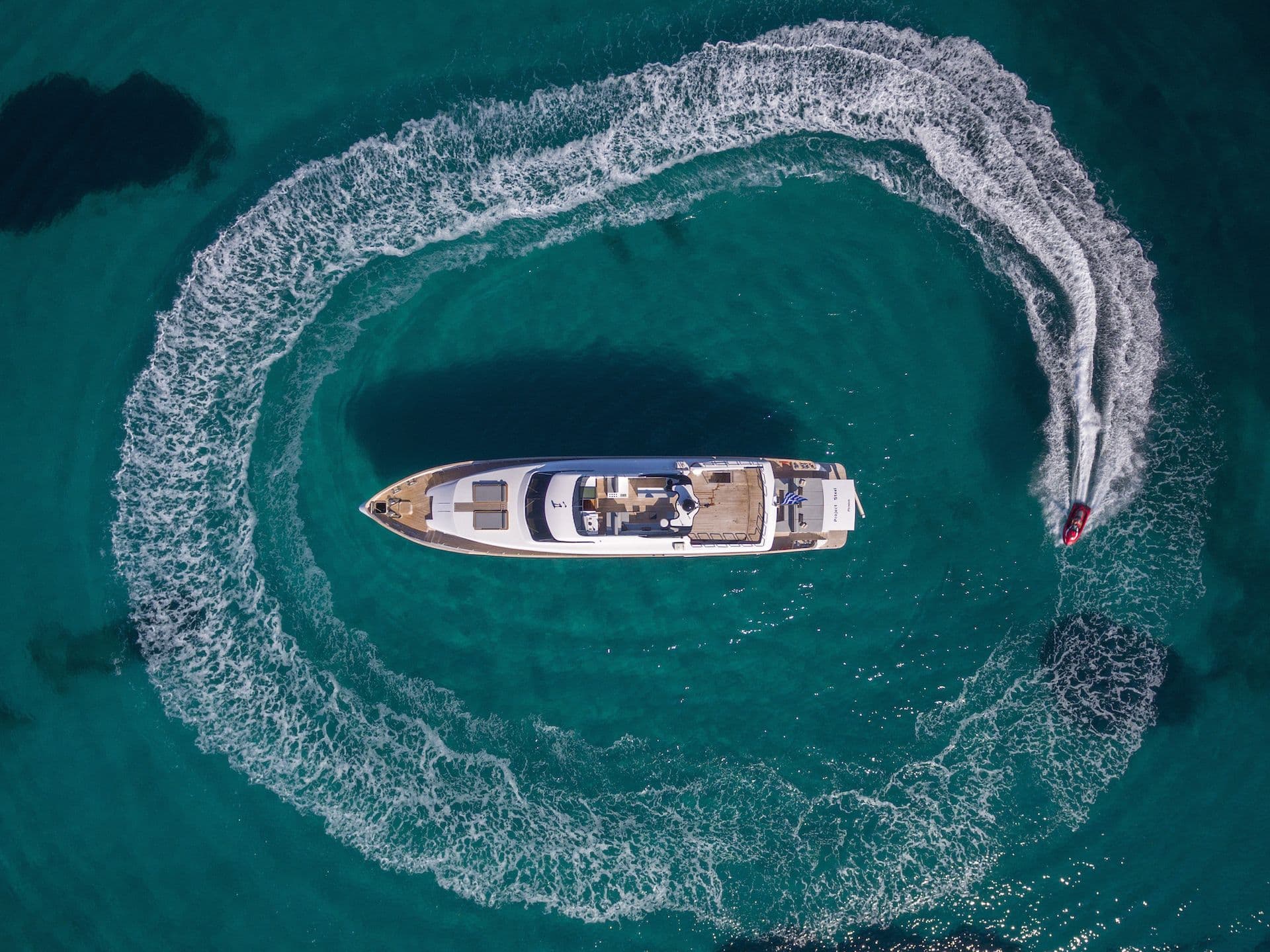 project steel crewed greece with boat sailing around it