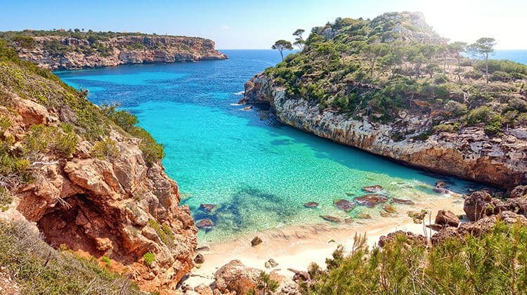 calo des moro bay with beach